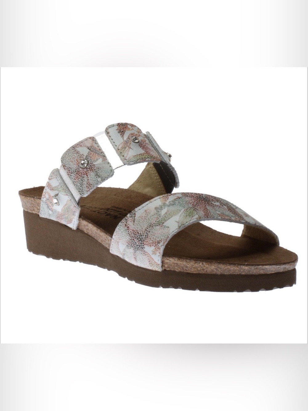 Ashley White Floral Leather Slide
Sandal by Naot size 11 like new. Used it once